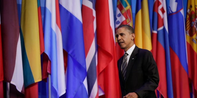 CHICAGO, IL - MAY 21: U.S. President Barack Obama arrives for a press conference at the closing of the NATO summit on May 21, 2012 at McCormick Place in Chicago, Illinois. As sixty heads of state converge for the two day summit that will address the situation in Afghanistan among other global defense issues, thousands of demonstrators have taken the streets to protest. (Photo by John Gress/Getty Images)