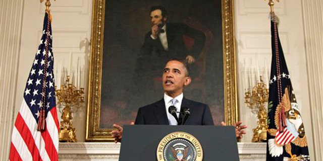 Monday: President Obama speaks in the State Dining Room of the White House on the S&P downgrade.