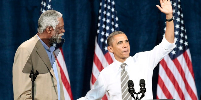 Sept. 25: President Barack Obama is introduced by NBA basketball hall-of-famer Bill Russell during a Democratic fundraiser at the Paramount Theater.