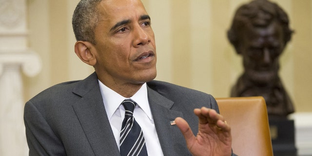 May 26, 2015: In this file photo, President Barack Obama speaks in the Oval Office of the White House in Washington.