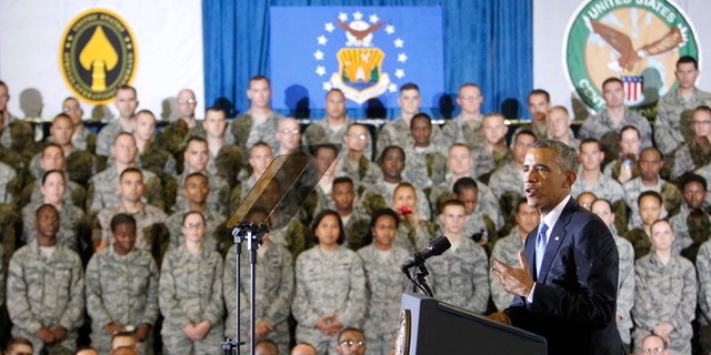 In this Wednesday, Sept. 17, 2014 photo, President Barack Obama delivers a speech to the soldiers at US Central Command (CentCom) at MacDill Air Force Base, Fla.