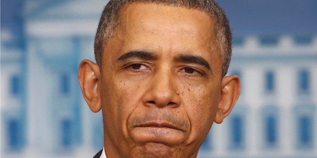 FILE: Nov. 14, 2013: President Obama in the Brady Press Briefing Room of the White House, in Washington, D.C.