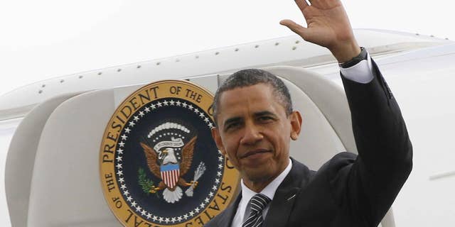 President Barack Obama steps off Air Force One in France. (AP Photo/Charles Dharapak)