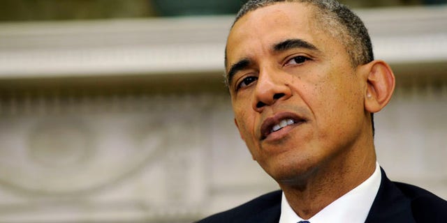 May 12, 2014: President Obama speaking during a press availability in the Oval Office of the White House in Washington.