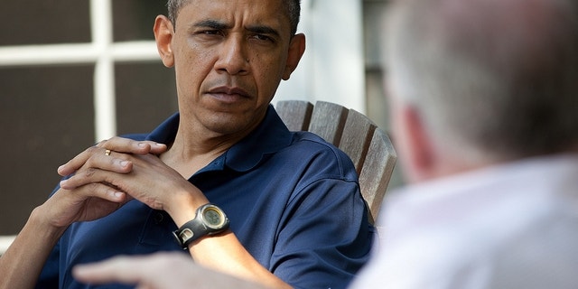 President Obama is briefed on the first day of his Martha's Vineyard vacation. (White House Photo)