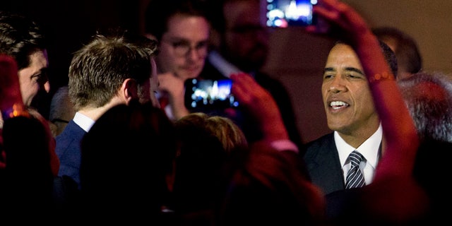 Sept. 27, 2015: President Barack Obama greets members of the crowd after speaking at a Democratic National Committee LGBT fundraising gala at Gotham Hall in New York. (AP Photo/Andrew Harnik)