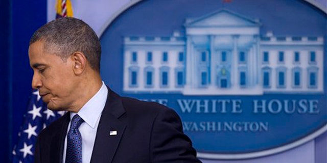 June 8, 2012: President Barack Obama leaves after speaking about the economy in the White House briefing room.