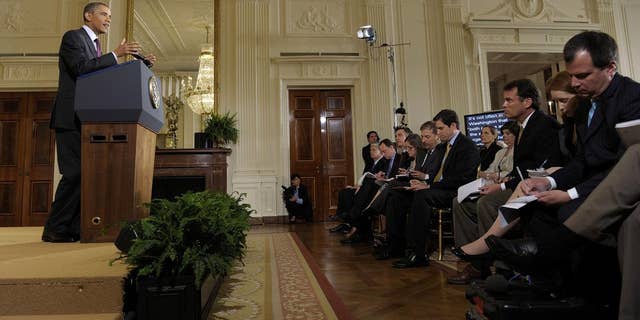 President Barack Obama gestures during a news conference in the East Room of the White House in Washington, Wednesday, June 29, 2011. (AP Photo/Susan Walsh)