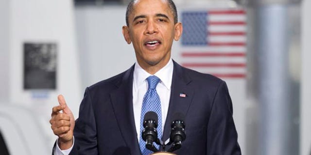 Friday: President Obama gestures while speaking at a UPS facility in Landover, Md.