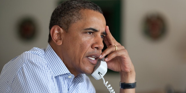 President Barack Obama holds conference call on Hurricane Irene with FEMA Director Craig Fugate, Homeland Security Secretary Janet Napolitano, Chief of Staff Bill Daley, and John Brennan, Assistant to the President for Homeland Security on Friday morning. (Official White House Photo)