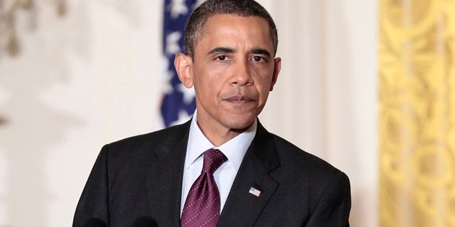 June 29: President Barack Obama delivers remarks to the audience as the LGBT Pride Month event at the White House in Washington.