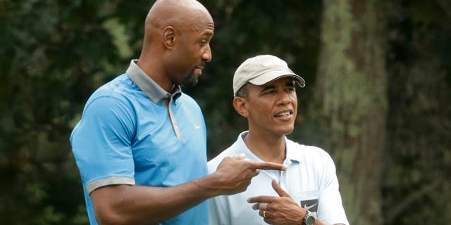 Aug. 17, 2014: Former NBA star Alonzo Mourning, left, and President Obama golfing at Farm Neck Golf Club, in Oak Bluffs, Mass., on Martha's Vineyard.