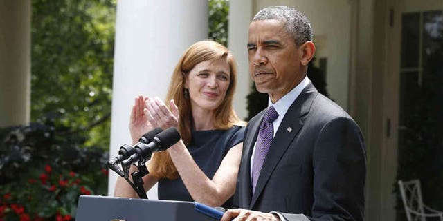 President Barack Obama stands with Samantha Power, his nominee to be the next UN Ambassador, left, Wednesday, June 5, 2013, in the Rose Garden at the White House in Washington.