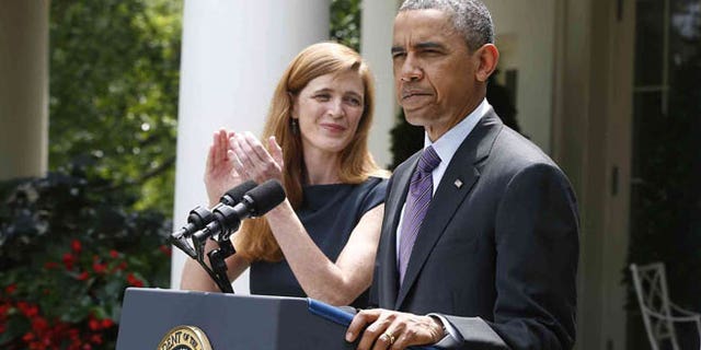 President Barack Obama stands with Samantha Power, his nominee to be the next UN Ambassador, left, Wednesday, June 5, 2013, in the Rose Garden at the White House in Washington.