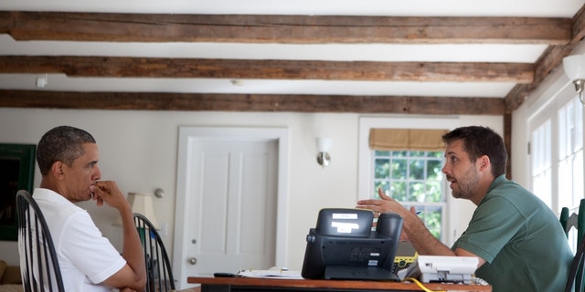 President Obama is briefed by economic adviser Brian Deese on Martha's Vineyard. (Official White House Photo)