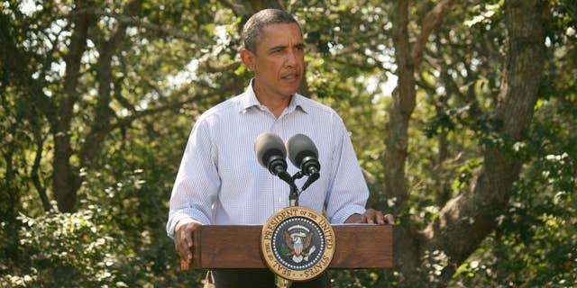President Obama delivers a statement on Hurricane Irene from Martha's Vineyard Friday morning. (Pool Photo)