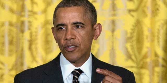 FILE:Jan. 23, 2014: President Obama in the East Room of the White House in Washington, D.C.