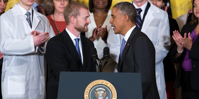 Oct. 29, 2014: President Barack Obama shakes hands with Ebola survivor Dr. Kent Brantly during an event with American health care workers fighting the Ebola virus.