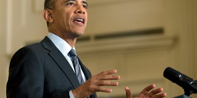 Jan. 31, 2014: President Obama gestures as he speaks in the East Room of the White House.