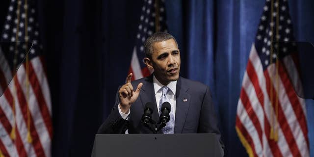 AP image/President Obama at a DNC fundraiser in Texas