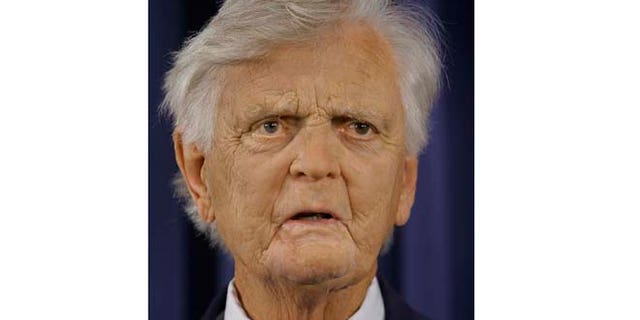 June 11, 2007: In this file photo, former Illinois Gov. Dan Walker speaks to reporters at the Illinois State Capitol in Springfield, Ill.