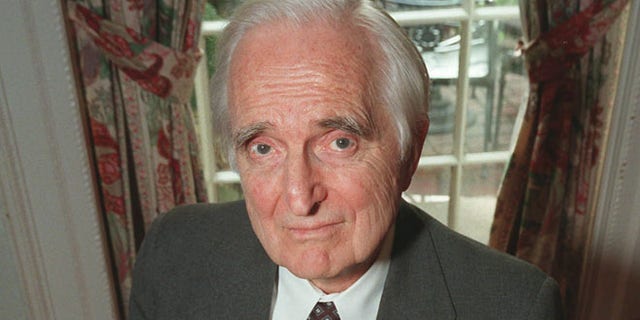 April 9, 1997: In this file photo, Doug Engelbart, inventor of the computer mouse and winner of the half-million dollar 1997 Lemelson-MIT prize, poses with the computer mouse he designed, in New York.