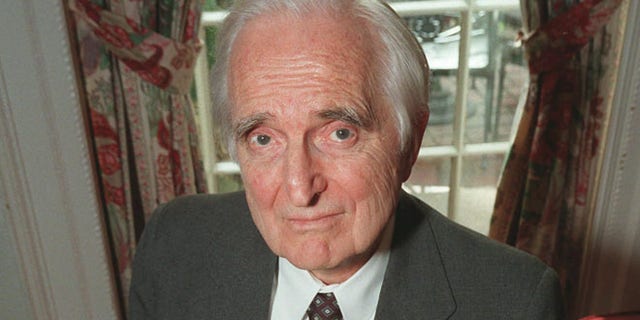 April 9, 1997: In this file photo, Doug Engelbart, inventor of the computer mouse and winner of the half-million dollar 1997 Lemelson-MIT prize, poses with the computer mouse he designed, in New York.