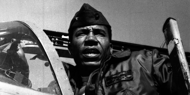 This undated photo provided by the Marine Corps shows Lt. Gen. Frank E. Petersen, Jr., the first black aviator and brigadier general in Marine Corps. Frank E. Petersen III said his father died Tuesday, Aug. 25, 2015, at his home in Stevensville, on Maryland's Kent Island, of complications from lung cancer. He was 83. (Marine Corps via AP)