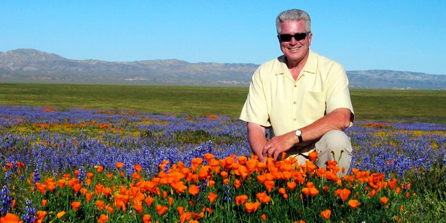 2005 FILE: TV host Huell Howser poses for a photo at the Antelope Valley California Poppy Reserve in Lancster, Calif.