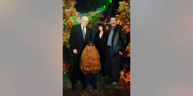 This Oct. 31, 2006 photo provided by ABC, shows some of the original cast of the TV show, "The Addams Family," from left, John Astin, (Gomez Addams), Felix Silla, (Cousin Itt), Lisa Loring, (Wednesday Addams) and Ken Weatherwax, (Pugsley Addams), reunited at a special Halloween edition of ABC's "Good Morning America" outside their Times Square studios in New York. Weatherwax, who played the child character Pugsley on "The Addams Family" television series in the 1960s, has died. He was 59. (AP Photo/ ABC, Ida Mae Astute)