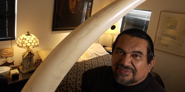 Sculptor Jesus Moroles in his home in Rockport, Texas, in a Feb. 2004 file photo.