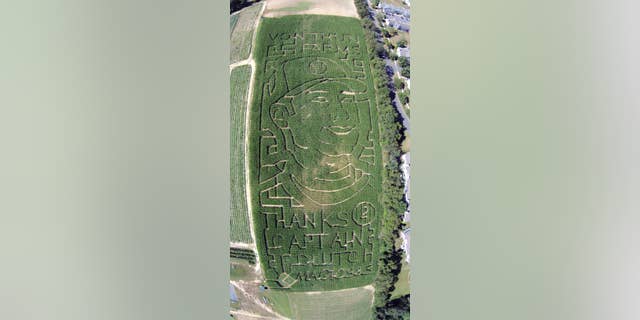 This Sept. 10, 2014, aerial drone photo provided by Seasoned Media depicts a corn maize honoring New York Yankees' Derek Jeter at a South Brunswick, N.J., farm. The VonThun Farm in central New Jersey, about 55 miles south of Yankee Stadium, carved a likeness of the Yankees captain and a thank you message to him into its five-acre corn maze. (AP Photo/Seasoned Media)