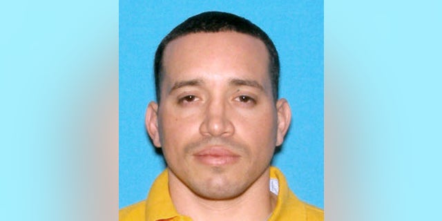 This undated identification photo released by the Massachusetts State Police shows Jorge Zambrano, killed Sunday, May 22, 2016, during an exchange of gunfire with police at an apartment building in Oxford, Mass. Zambrano had been suspected in the shooting death of Auburn, Mass., Police Officer Ronald Tarentino during a traffic stop early Sunday morning. (Massachusetts State Police via AP)