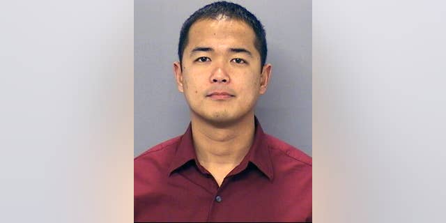This undated photo provided by the San Diego Police Department shows San Diego Police officer Jonathan DeGuzman who was killed in a shooting  Thursday, July 28, 2016. DeGuzman, a 16-year veteran, is survived by a wife and two young children. A suspect was wounded and taken into custody a short time later and hours later police surrounded a home as they searched for man described as a possible accomplice. (San Diego Police Department via AP)
