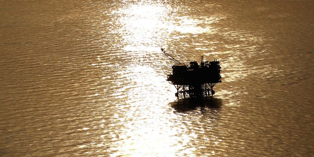 NEW ORLEANS - APRIL 28: Oil platforms sit in the Gulf of Mexico near the Louisiana coast line on April 28, 2010. (Photo by Chris Graythen/Getty Images)