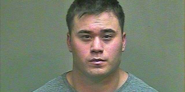 This Aug. 21, 2014 photo made available by the Oklahoma County Sheriff's Office shows Daniel K. Holtzclaw. The 27-year-old Oklahoma City police officer was arrested Thursday, Aug. 21, 2014 and is being held in lieu of $5 million bond after being accused of committing a series of sexual assaults against at least six women while on duty. (AP Photo/Oklahoma County Sheriff's Office)