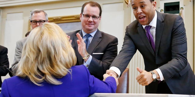Feb. 3, 2014: Speaker of the Oklahoma House T.W. Shannon, right, greets Oklahoma Governor Mary Fallin, left, during a joint session of the legislature in Oklahoma City.