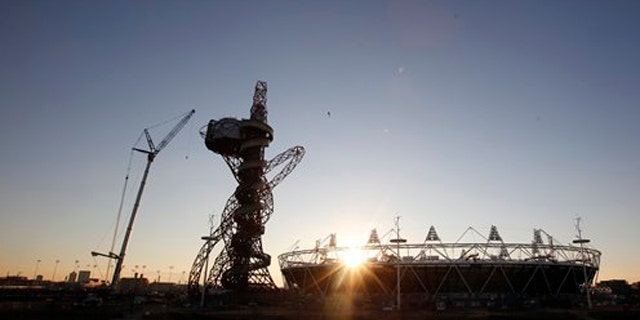 Feb. 23, 2012: The London 2012 Olympic Stadium is seen at about sunset, with the partially completed ArcelorMittal Orbit at the Olympic Park in London.