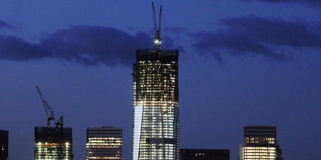 January 18, 2012: One World Trade Center, now up to the 90th floor, rises above the lower Manhattan skyline in New York.