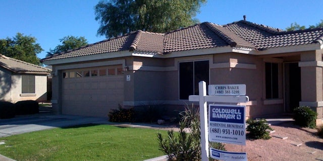 Open house signs in front of house