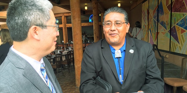 U.S. Associate Deputy Attorney General Bruce Ohris, left, and Santa Clara Pueblo Gov. J. Michael Chavarria.