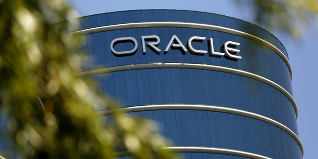 The Oracle logo is seen on its campus in Redwood City, California June 15, 2015.