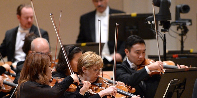 NEW YORK, NY - OCTOBER 07: The New York Philharmonic performs on stage during the Carnegie Hall 125th season opening night gala at Carnegie Hall on October 7, 2015 in New York City. (Photo by Andrew Toth/Getty Images)