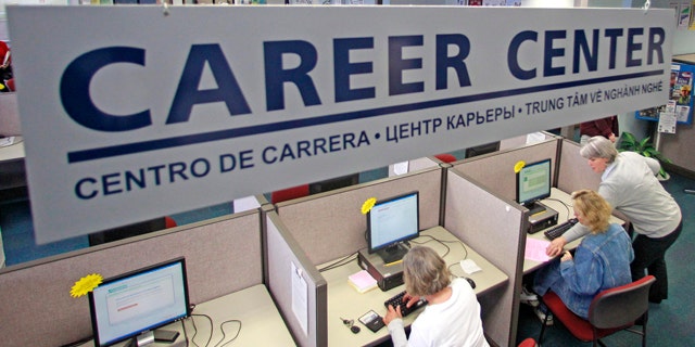 May 17: Job searches use computers to search for jobs at WorkSource Oregon, in Tualatin, Ore.