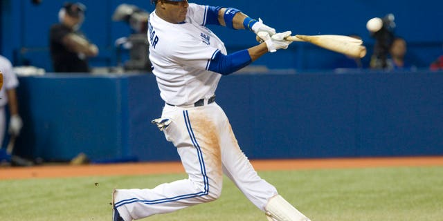 Sept. 5, 2012: Toronto Blue Jays' Yunel Escobar breaks his bat as he hits a double off a ball from Baltimore Orioles pitcher Miguel Gonzalez during the seventh inning of baseball game action in Toronto.