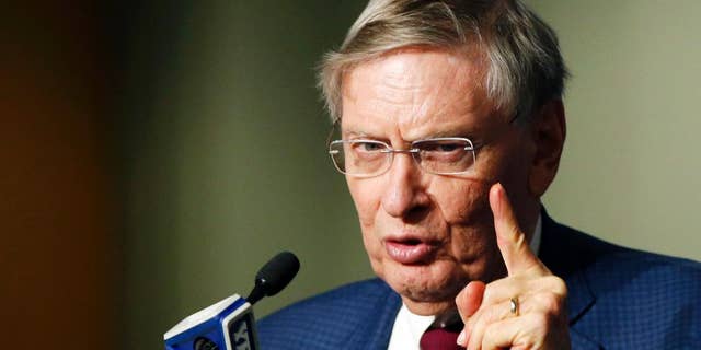 Major League Baseball Commissioner Bud Selig speaks to the media before a baseball game between the New York Yankees and the Baltimore Orioles at Yankee Stadium in New York, Tuesday, Sept. 23, 2014. (AP Photo/Kathy Willens)