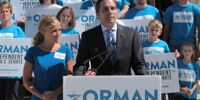 FILE: July 28, 2014: Greg Orman an independent candidate for Senate in Kansas, and wife Sybil campaigning in Topeka, Kansas.