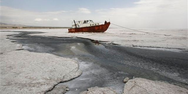 April 29: An abandoned boat is stuck in the solidified salts of the Oroumieh Lake, some 370 miles northwest of the capital Tehran, Iran.