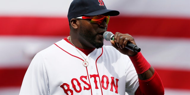 Boston Red Sox's David Ortiz speaks to the crowd before a baseball against the Kansas City Royals in Boston, Saturday, April 20, 2013. (AP Photo/Michael Dwyer)