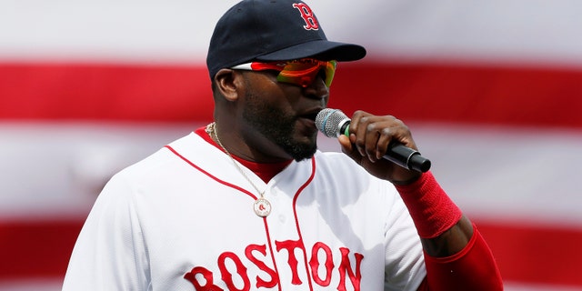 Boston Red Sox's David Ortiz speaks to the crowd before a baseball against the Kansas City Royals in Boston, Saturday, April 20, 2013. (AP Photo/Michael Dwyer)